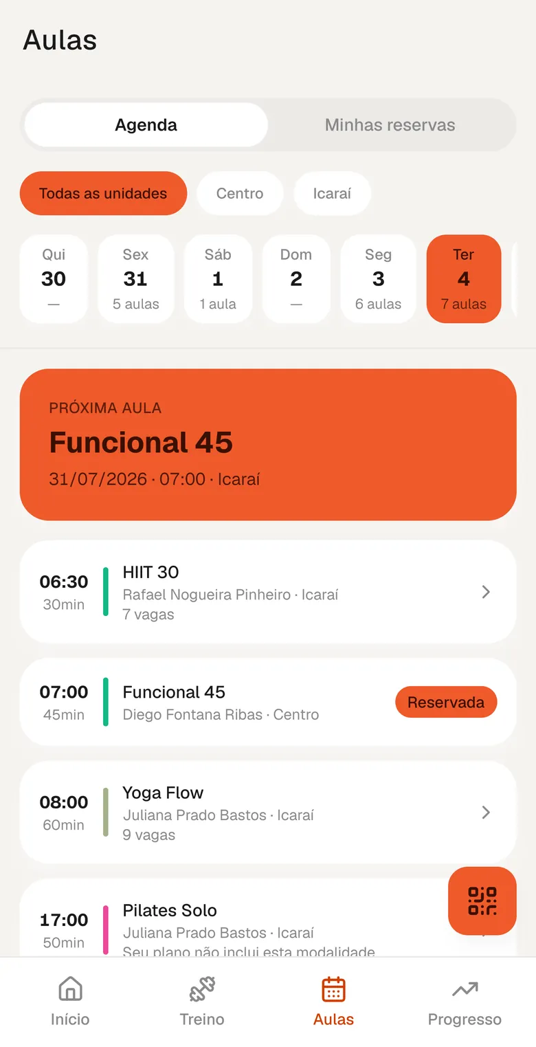 Grade de aulas do dia no app, com vagas e reserva confirmada